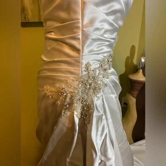 Clearance Sale: Platinum Satin Sleeveless Wedding Gown with ruching, rhinestones & Corset