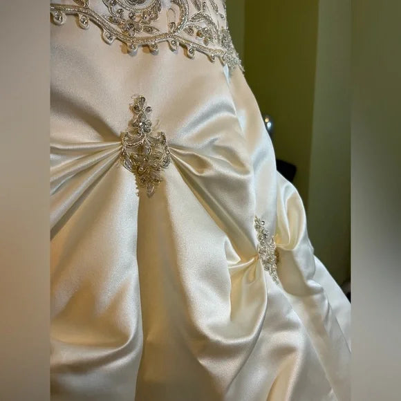 Clearance Sale: Princess Wedding Gown with a Sleeveless Bodice, Rhinestones and Pickup Skirt.